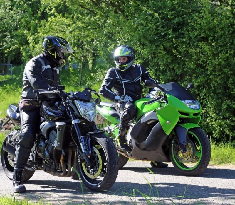 Two motorcyclists with a short interstop